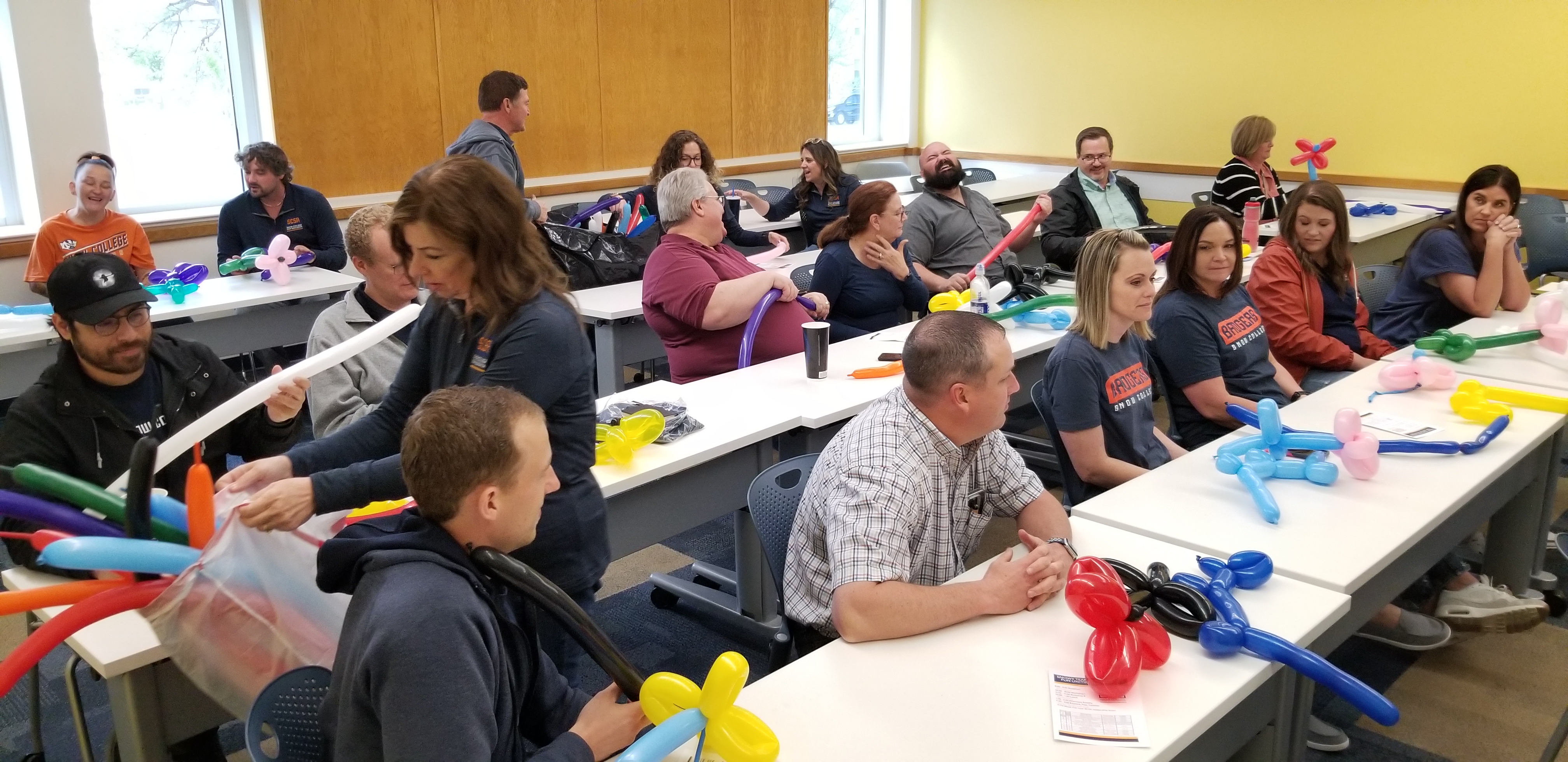 Staff members making balloon animals